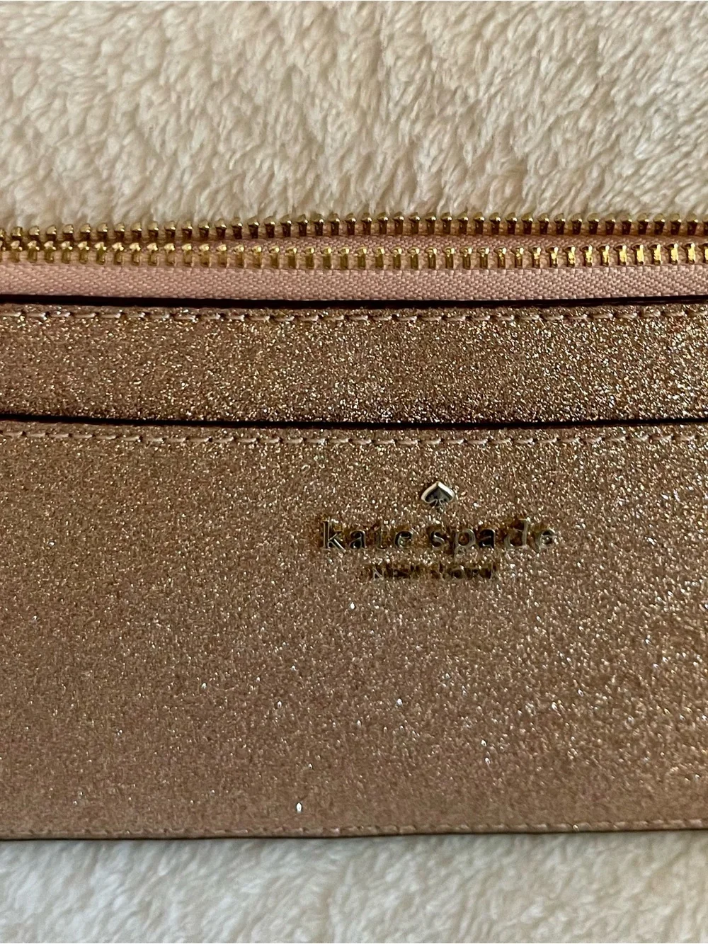 kate spade Rose Gold Glitter Zip Wristlet